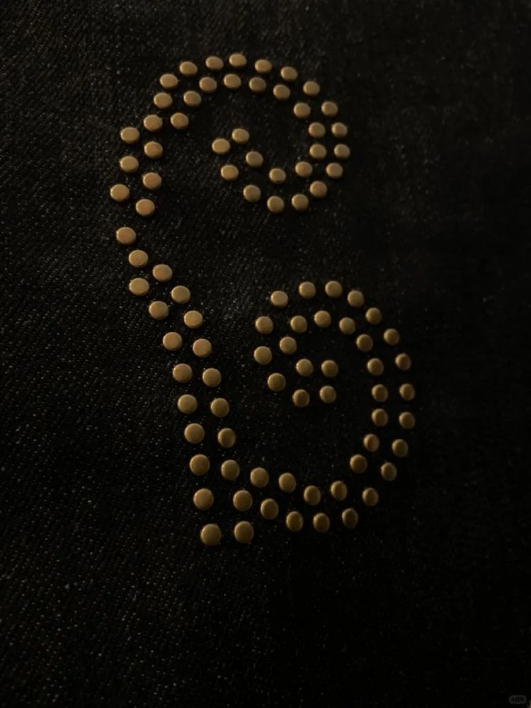 Metal Rivets decoration craft on custom apparel by Huaxing Apparel