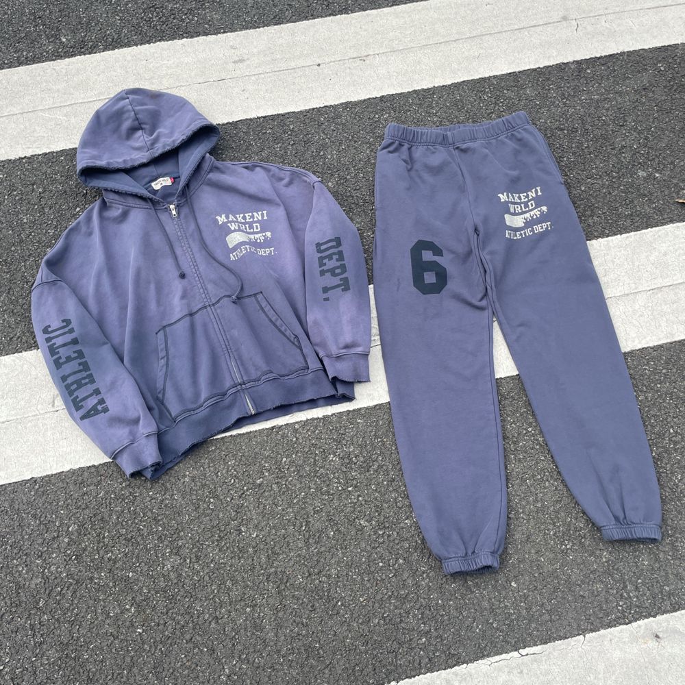 Custom Sweatsuit in French Terry 425GSM with Screen printing, Sun-faded effect, Distressed holes, Cuffed leg openings manufactured by Huaxing Apparel