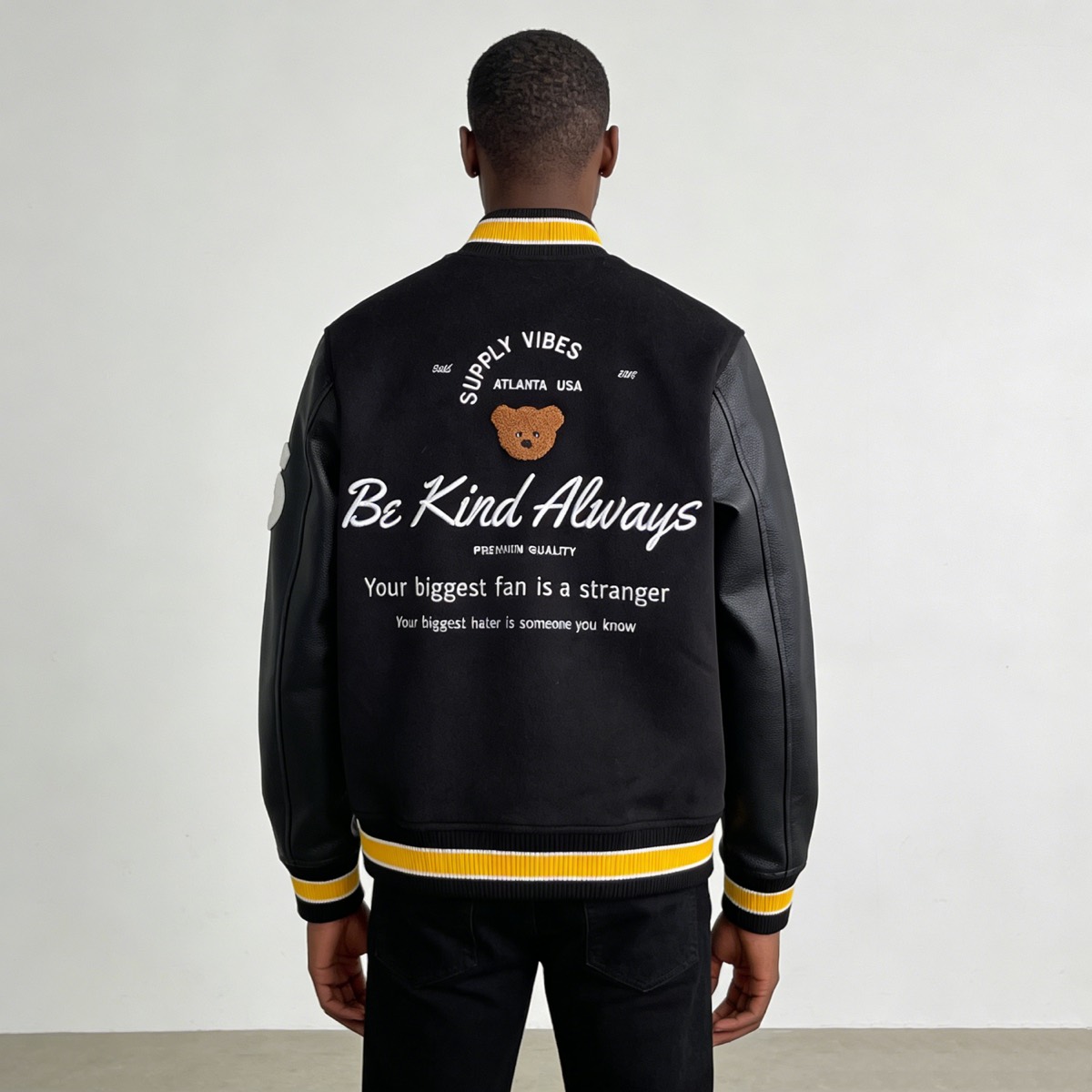 Custom chenille-patch varsity jacket manufactured by Huaxing Apparel