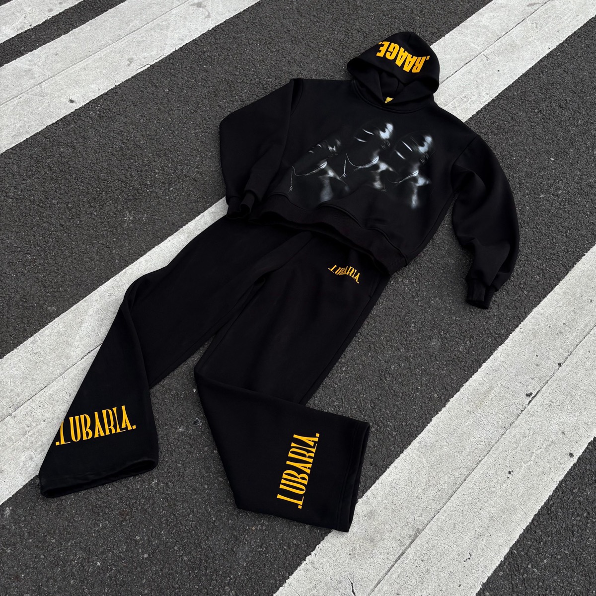 Custom hoodie and sweatpant tracksuit set manufactured by Huaxing Apparel