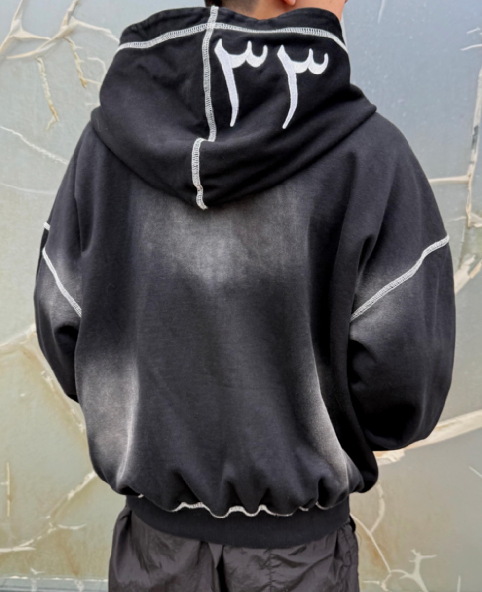 Sun-Faded Black — custom apparel technique at Huaxing Apparel, Dongguan